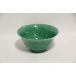 A Chinese porcelain bright-green glazed deep bowl with flared rim, a leaf-mark to underside; 5¾”