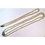 A two-strand necklace of graduated cultured pearls, with 9ct. gold pearl-set circular clasp; a