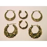 Three pairs of 9ct. gold half-hoop earrings. (7.4gm).