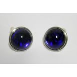 A pair of modern Lalique deep blue glass dome-shaped ear clips; in original box.