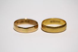 A 22ct. gold wedding band (4 gm); & an 18ct. gold ditto (2.7gm).