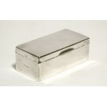 A plain rectangular cigarette box with hinged lid & wood-lined interior, 6¾" wide; Birmingham
