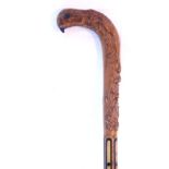 An early/mid 20th century gent's walking stick with carved parrot's head, dog & pheasant handle, 34"