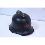 A German Third Reich fire defence safety helmet.