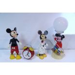 A 1977 Walt Disney celluloid “Mickey Mouse” table lamp with frosted glass globular shade, 17¼” high;