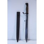 A WWI German Mauser Butcher bayonet with 14¼” long single-edge curved blade, with treen grip & steel