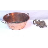 A copper two-handled preserve pan, 14¼" diam.; & a cast-brass door knocker.