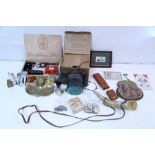 A French powder horn; twelve various cigarette lighters; a 1930's respirator, boxed; seven