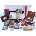 A brass miniature fender, 7¼" long; a pokerwork photograph frame; various items of ephemera; &