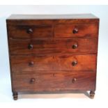 An early Victorian figured mahogany chest fitted two short & three long graduated drawers with