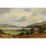 141. TREVOR, G. An extensive lake landscape with hills in the distance. Signed; watercolour: 14" x