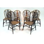 A matched set of six ash & elm Windsor chairs, including a pair of elbow chairs, with hooped spindle