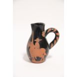 A PABLO PICASSO TERRACOTTA ‘PICADOR’ JUG with wax resist decoration; 5" high