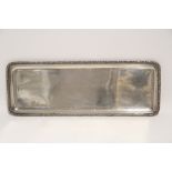 A Czechoslovakian ·800 standard narrow oblong tray with scroll border; 16" x 6". (18oz.)