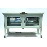 A late 19th century French painted cabinet enclosed pair bevelled glass doors & with bevelled