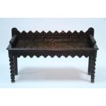 A Victorian oak hall bench with low back & apron, with turned arms & on bobbin-turned legs; 41½"