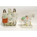 A Victorian Staffordshire pottery flat-back clock ornament with standing male & female figure either