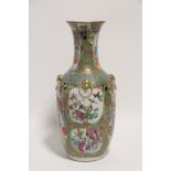 A 19th century Cantonese porcelain ovoid vase with tall narrow neck & animal-head & ring handles