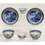 A pair of late 18th century English porcelain blue transfer “Willow” pattern teabowls & saucers with