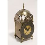 A 17th century style brass lantern clock, the 6½" diam. dial inscribed “R. Smith, London”, & with