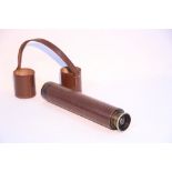 An early 20th century brass three-drawer telescope by Broadhurst, Clarkson & Co. of London, with