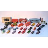 Approximately twenty various die-cast scale models by Dinky, Lesney, & others, all un-boxed.