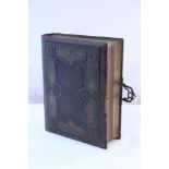 A Victorian leather-bound family photograph album containing thirty-four black & white carte-de-