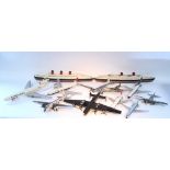 Twenty-one various model kit aeroplanes & cruise liners, all assembled, un-boxed.