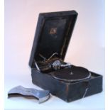 An HMV portable gramophone in black fibre-covered case; together with approximately one hundred