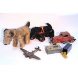 A Chad Valley lithographed tinplate clockwork-operated toy car; two soft toy dogs; a set of Chad