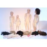 Five modern bisque-head dolls, with various accessories & stands.
