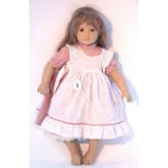 An Annette Himstedt girl doll “Neblina”, 25½" tall, dressed.