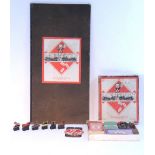 A WWII issue Waddingtons “Monopoly” board game made with recycled paper & card, with card player