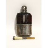 A late Victorian crocodile skin covered glass spirit flask with silver hinged top & detachable cup