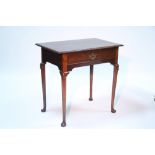 A George II style mahogany side table fitted frieze drawer, on turned tapered legs with lappet knees