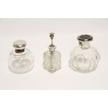 A cut glass spherical toilet water bottle with silver & tortoiseshell hinged lid, 4½" high, London