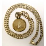 A 9ct gold necklace of flat curb links (14.7g); & a gold-mounted circular photo. locket.