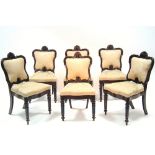 A SET OF SIX WILLIAM IV ROSEWOOD DINING CHAIRS with carved foliate top-rails, the padded backs &
