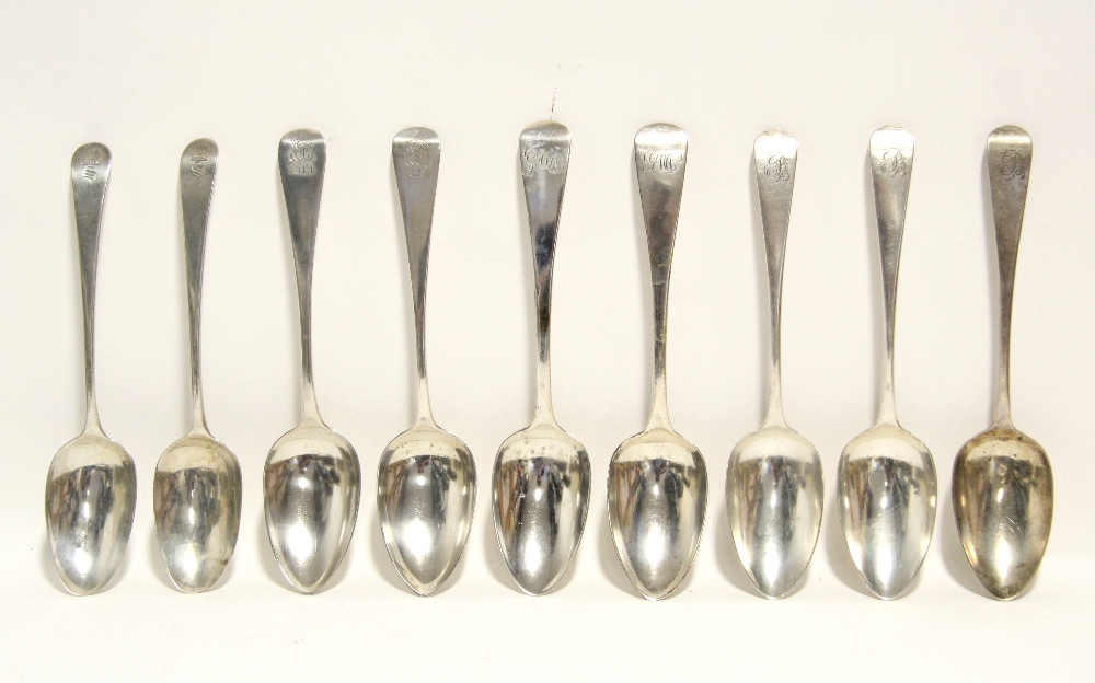 A pair of George III Old English table spoons, London 1791 by Geo. Smith; another pair, 1813 by