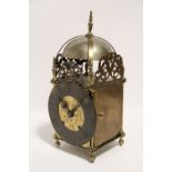 A 17th century style brass lantern clock, the 6½" diam. dial inscribed “R. Smith, London”, & with