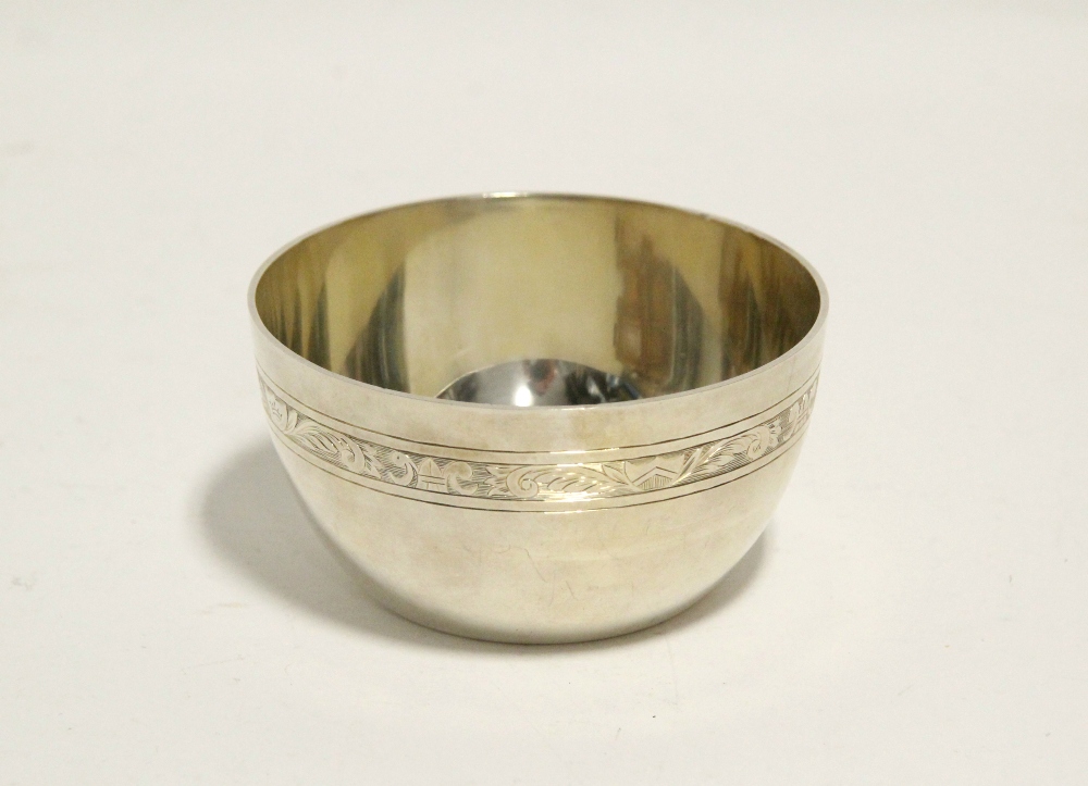 A modern heavy-gauge circular deep bowl with engraved narrow leaf-scroll band to the exterior, 4”