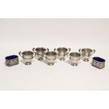 A set of six late Victorian novelty egg cups in the form of miniature two-handled trophy cups, 2"