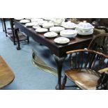 A Chippendale style mahogany serving table with shaped apron, on four cabriole legs with claw-ball