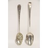 A George III Old English basting spoon with engraved family crest to terminal, 11¾” long; London