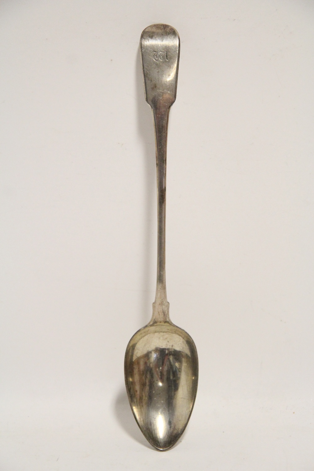 A George III Fiddle pattern basting spoons, 12¼" long; London 1798, by George Smith. (5oz)