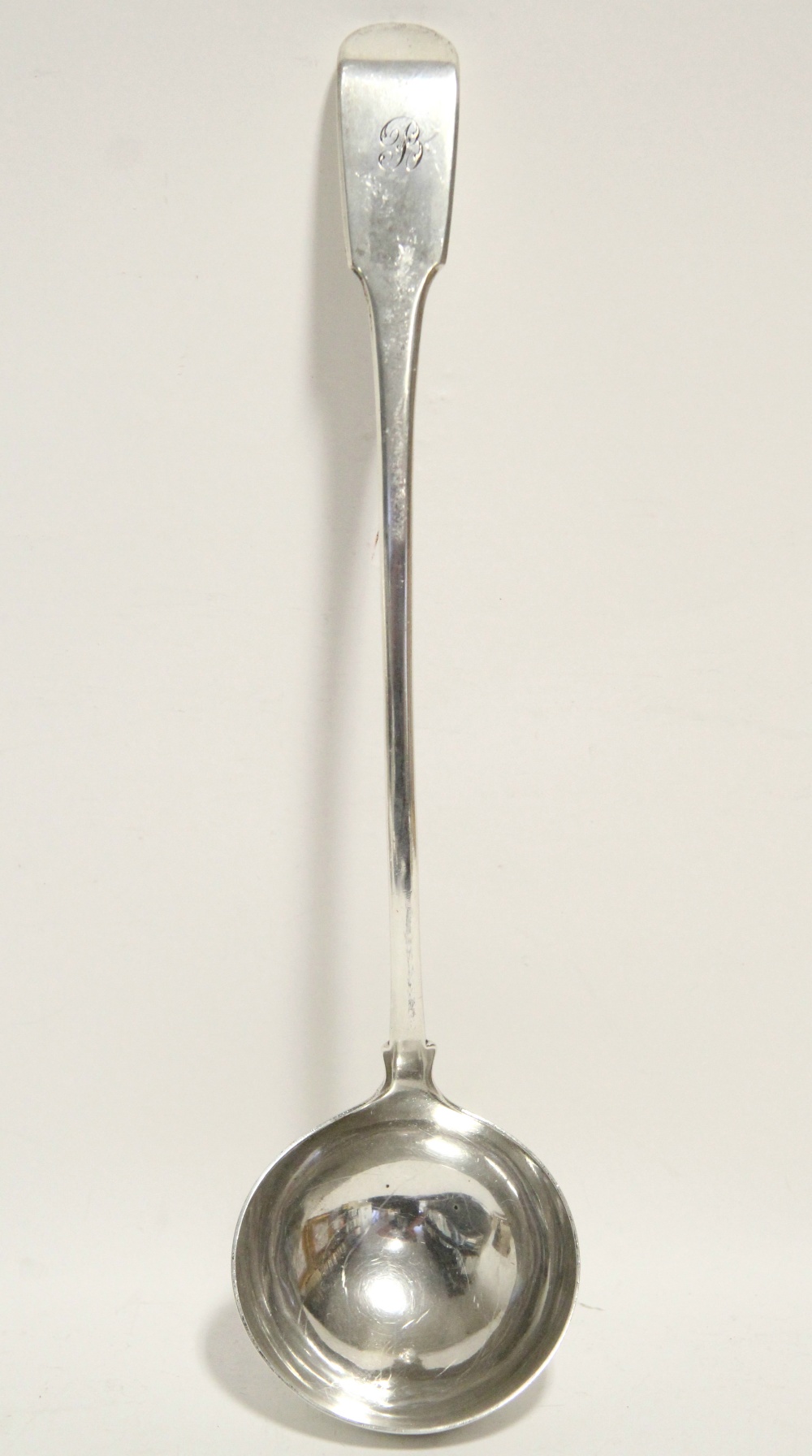 A George III Fiddle pattern soup ladle with circular bowl; London 1802, by Thomas Wallis. (7½ oz)