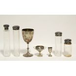 A Victorian goblet with plain ovoid bowl, 5½” high, Birmingham 1886; two miniature silver trophy