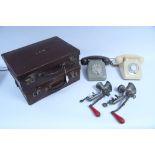 Two tan leather briefcases; two Bakelite telephones; two meat mincers, etc.