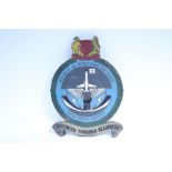 A painted metal sign “REPUBLIC OF SINGAPORE AIR FORCE, PAYA LEBAR AIRPORT”, 23½” x 16¾”.