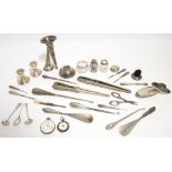 Various silver or silver-mounted manicure items, glove stretchers, pair of dwarf candlesticks, etc.